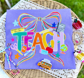 Teach Coquette Bow Graphic Tee