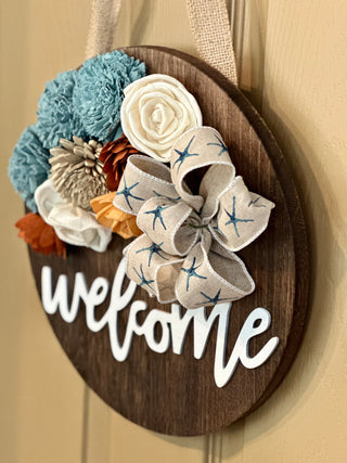 ‘Welcome’ Wood Flower Round - Blue, Rust and Cream