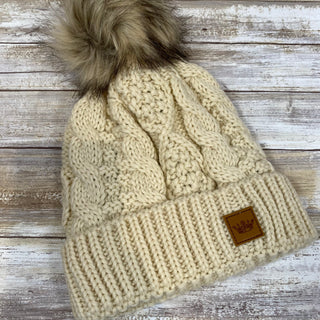 Cream Fleece Lined Cable Knit Hat with Large Pom Accent